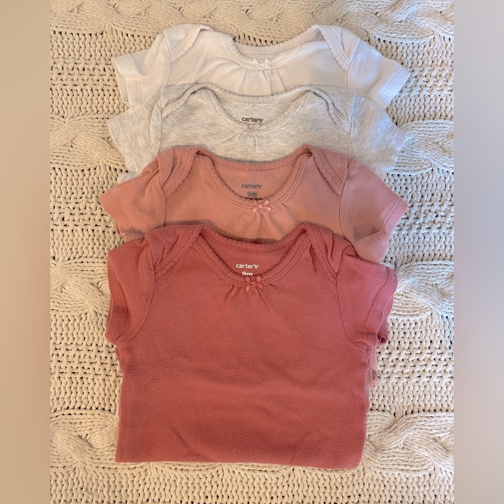 Carter’s four piece onesie set